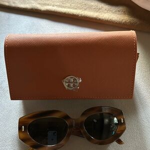Never worn Tory Burch Sunglasses.
